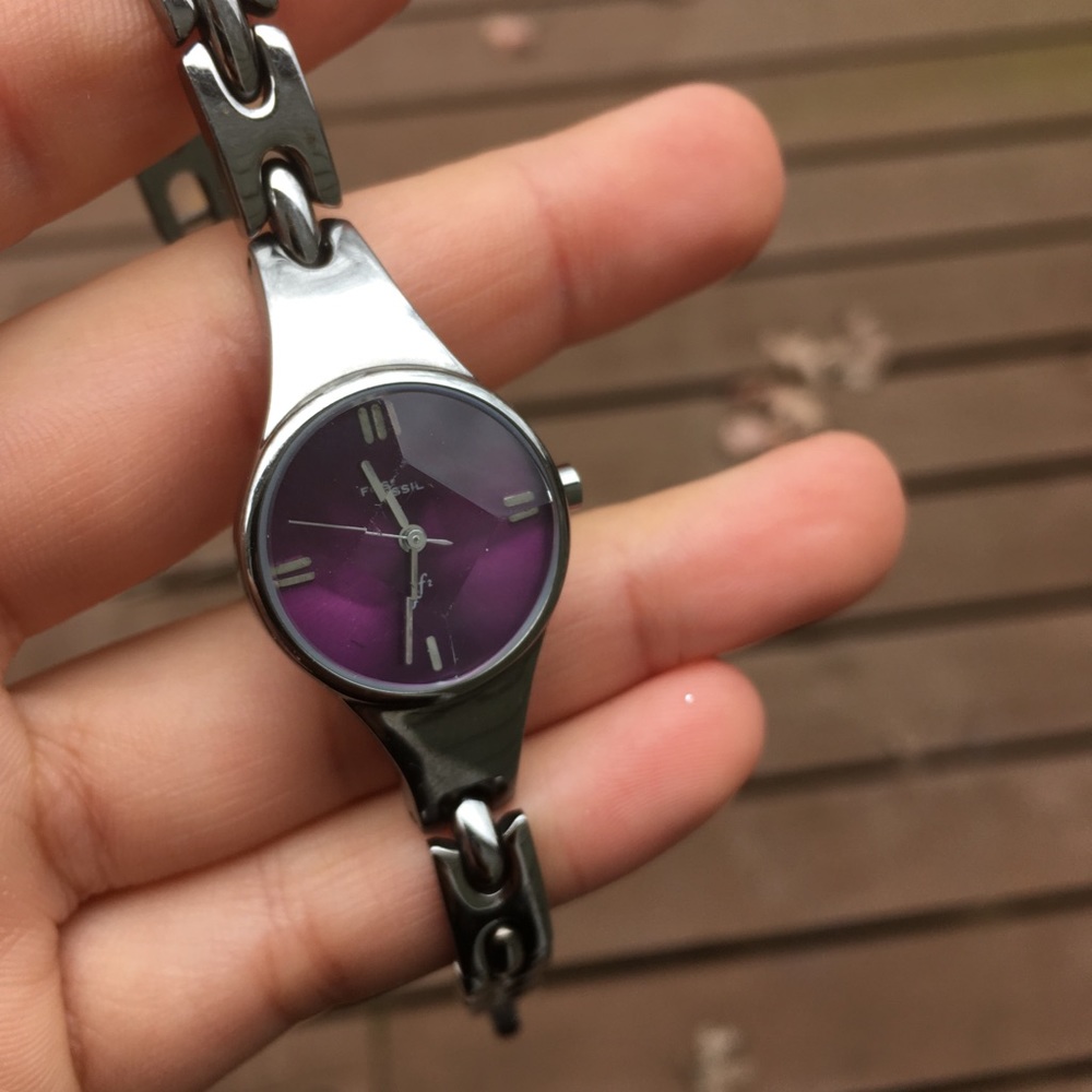 Gray Fossil watch with purple interior